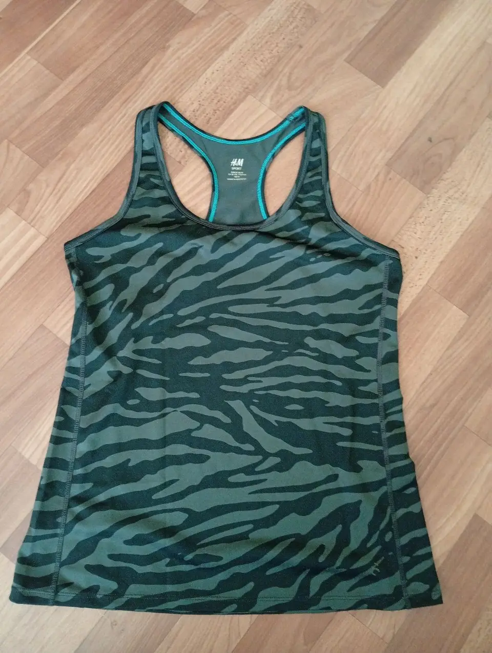 H&M Sport sportinė liemenėlė-marškinėliai