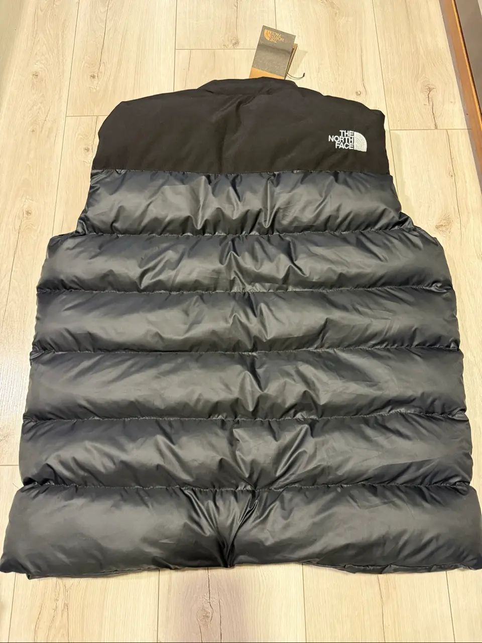 The North Face pūkinė liemenė juoda — nuotrauka 2