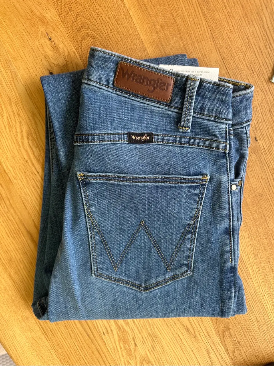 Nauji Wrangler džinsai